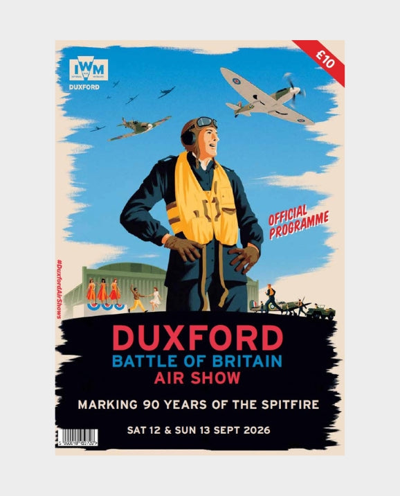A vintage-style illustrated programme cover for the Duxford Battle of Britain Air Show, featuring a pilot in a yellow life vest under a blue sky with fighter planes, with large text reading 'DUXFORD BATTLE OF BRITAIN AIR SHOW' and 'OFFICIAL PROGRAMME'.