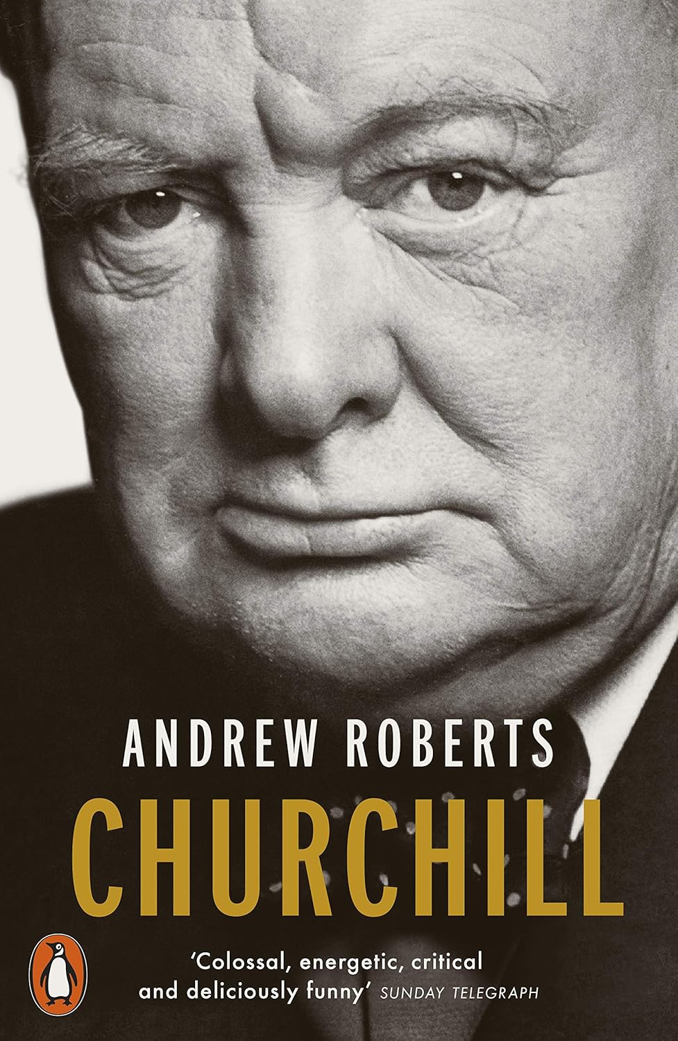 Book cover of 'Churchill' by Andrew Roberts with a black and white portrait of a man.