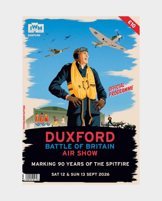 A vintage-style illustrated programme cover for the Duxford Battle of Britain Air Show, featuring a pilot in a yellow life vest under a blue sky with fighter planes, with large text reading 'DUXFORD BATTLE OF BRITAIN AIR SHOW' and 'OFFICIAL PROGRAMME'.