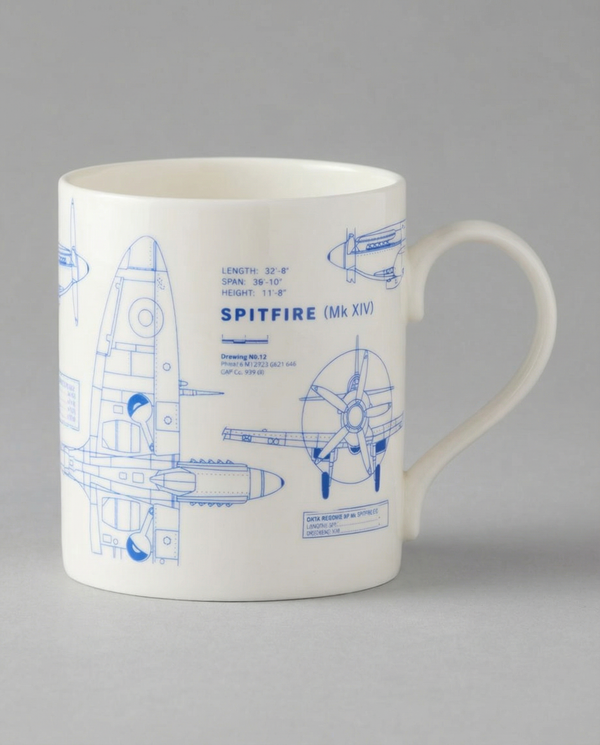White mug with blue Spitfire Mk XIV blueprint design on a gray background